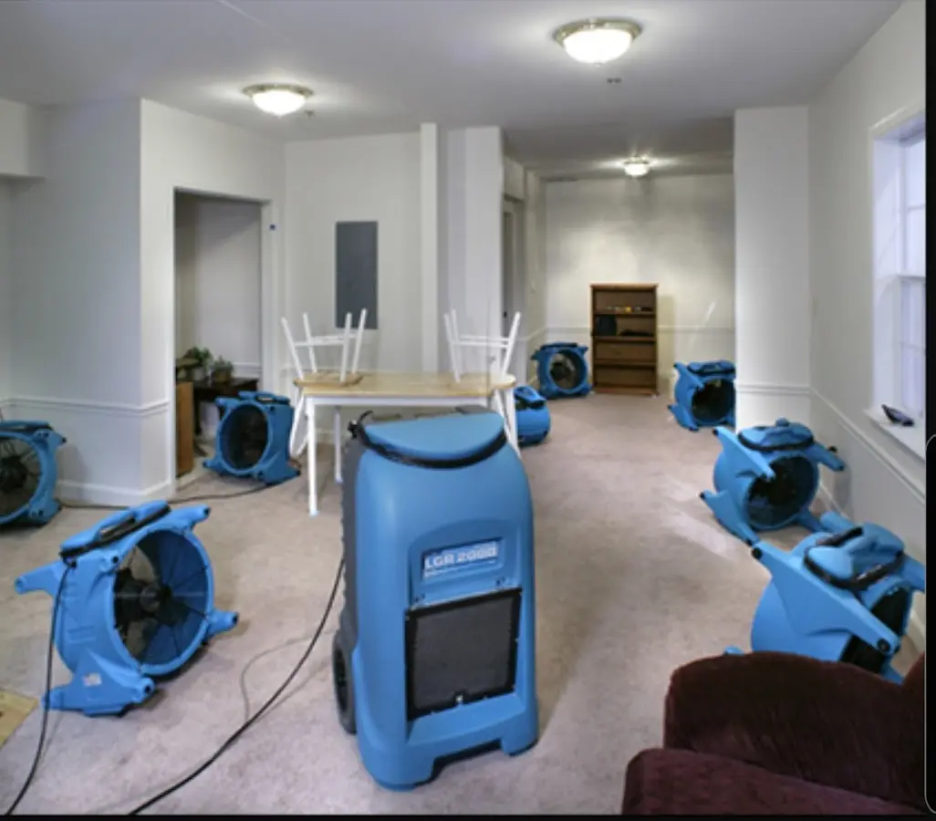 Air movers and dehumidifier setup for Water Damage Restoration in Eaton